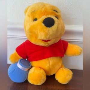 Vintage Disney Pooh Bear Plush Toy with Red and Yellow Colors